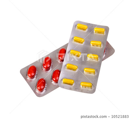 Medicine pills and capsules packed in blisters 10521883
