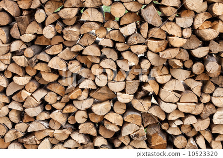 stack of chopped fire wood 10523320
