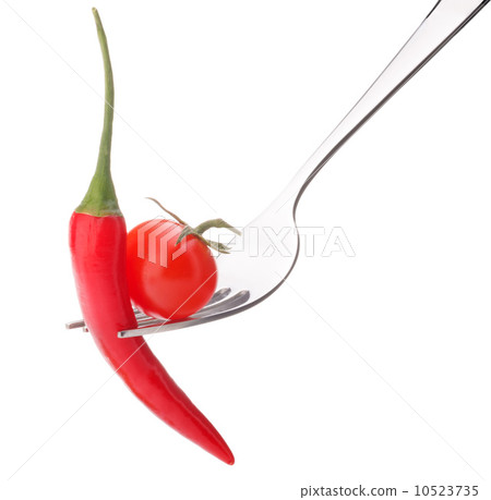 Fresh raw vegetables on fork isolated on white background cutout Fresh raw vegetables on fork isolated on white background cutout 10523735
