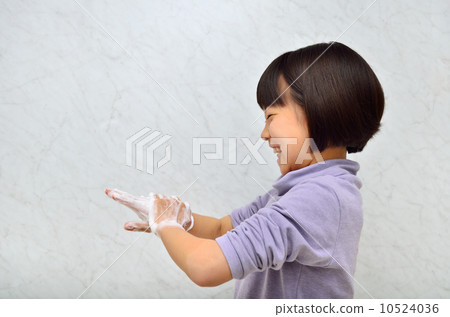 Girl washing hands 10524036
