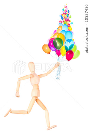 wooden Dummy holding flying balloons isolated wooden Dummy holding flying balloons isolated 10527456
