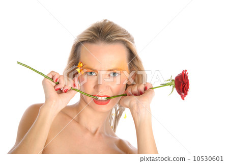 Young woman bites flower stalk 10530601