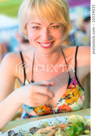 Woman eating healthy food. Woman eating healthy food. 10534035