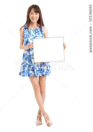 A woman in a blue dress 10536095