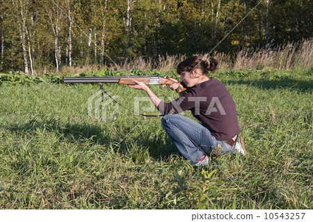 The girl aims from a gun 10543257