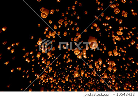 Floating paper lantern in night sky Floating paper lantern in night sky 10548438