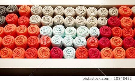 T-shirt rolled in shelf, Abstract background T-shirt rolled in shelf, Abstract background 10548452