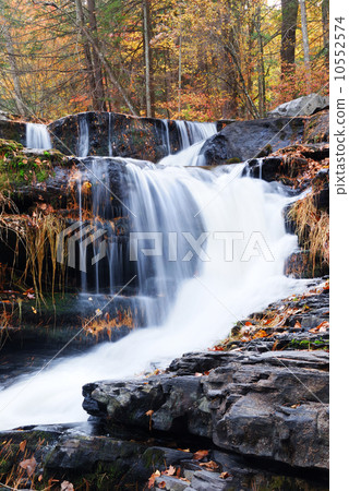 Autumn Waterfall in mountain 10552574