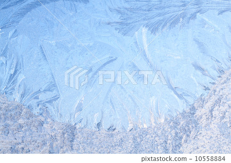 Rime on frosted window glass 10558884