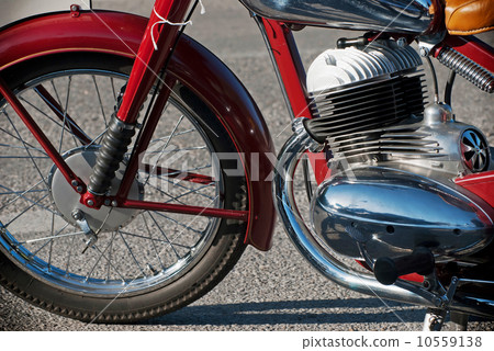 Side view of a veteran motorbike Side view of a veteran motorbike 10559138