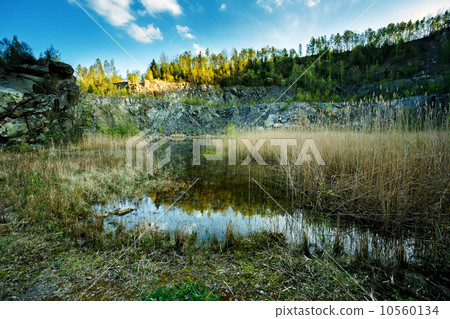 small flooded quarry 10560134