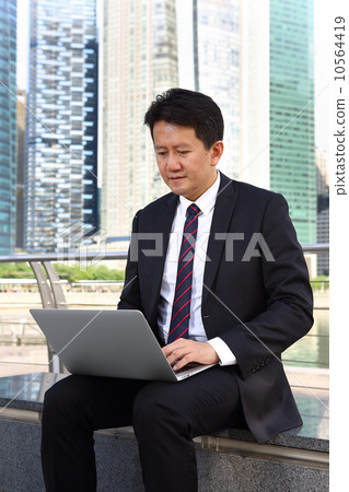 Asian men who use computer Asian men who use computer 10564419