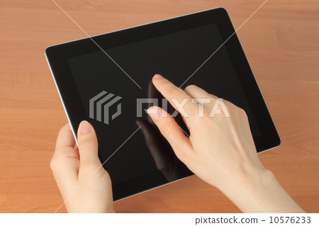 Hand toching tablet PC . Hand toching tablet PC . 10576233