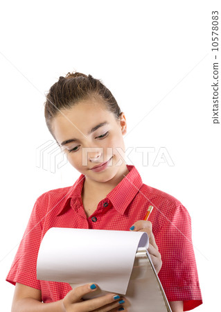 teenage girl writing on a pad, isolated on white teenage girl writing on a pad, isolated on white 10578083