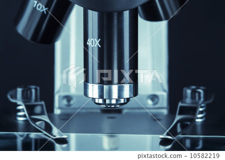 close up of a microscope slide with black background 10582219