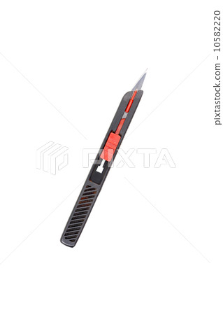 an old used black scalpel, isolated on white an old used black scalpel, isolated on white 10582220