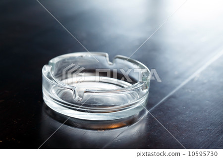 ashtray on wood table 10595730
