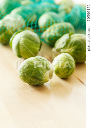 Brussels sprouts cabbage on old wooden table Brussels sprouts cabbage on old wooden table 10596151