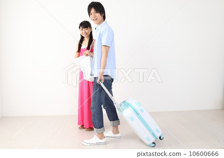 A couple while traveling 10600666