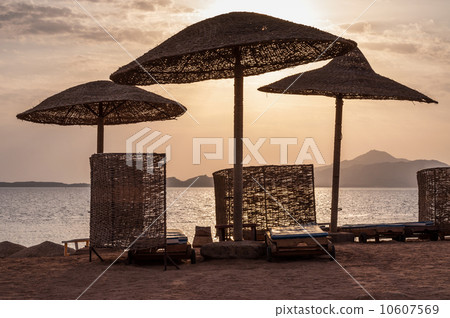 Beach umbrellas in the sunlight, Sharm el Sheikh, Egypt 10607569