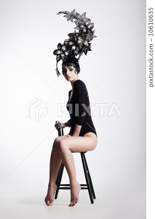 Artistic Fancy Woman wearing Extraordinary Fancy Headdress 10610635