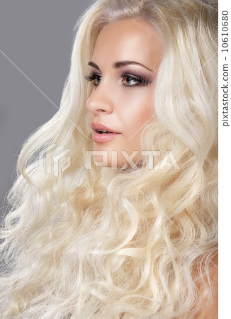 Groomed Woman's Face. Ash-colored Curly Hair Groomed Woman's Face. Ash-colored Curly Hair 10610680