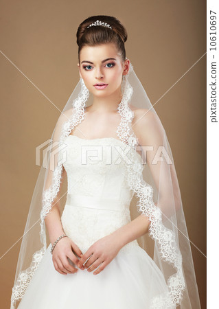 Wedding. Portrait of Lady with White Veil 10610697