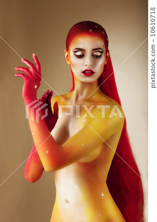 Face Art. Bodypaint. Trendy Woman with Colorful Painted Skin 10610718