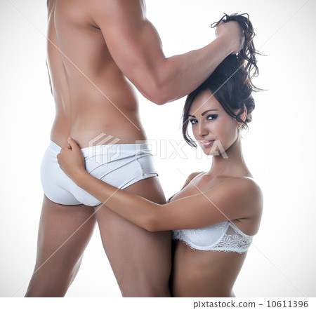 Image of young sensual lovers posing at camera 10611396