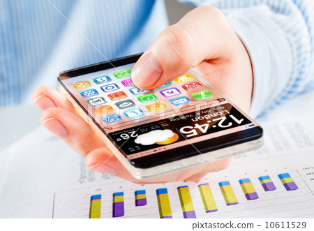 Smartphone with transparent screen in human hands. 10611529
