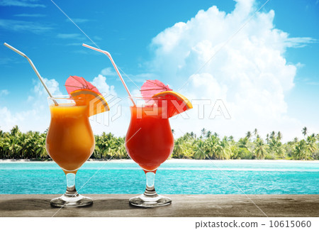 Two fresh juices on beach Two fresh juices on beach 10615060