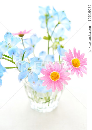 Cute flower with roll cake and tea. 10619082