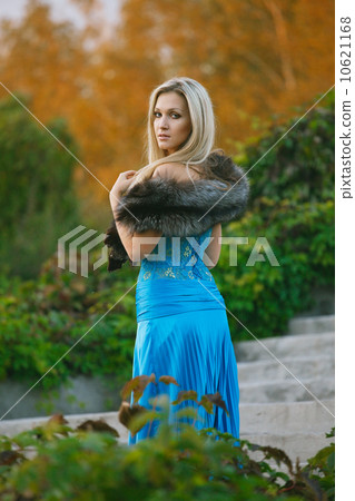 Fashion portrait of young sensual woman in garden Fashion portrait of young sensual woman in garden 10621168