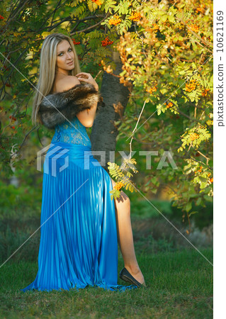 Fashion portrait of young sensual woman in garden Fashion portrait of young sensual woman in garden 10621169