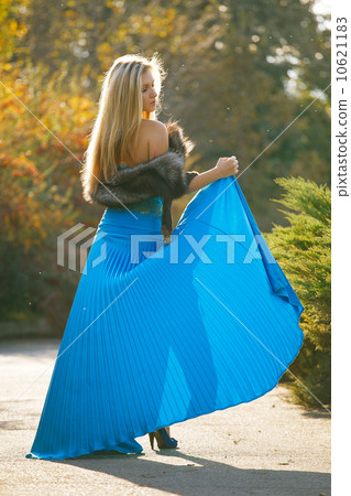 Fashion portrait of young sensual woman in garden 10621183