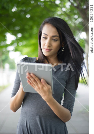 Asian Beauty using tab 10634351