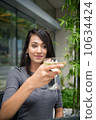Asian Beauty having wine 10634424