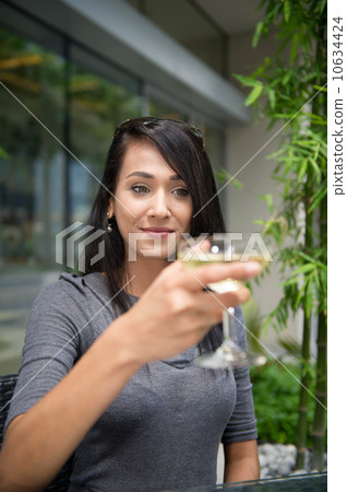 Asian Beauty having wine 10634424