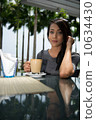Asian Beauty enjoying coffee 10634430
