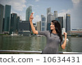 Asian Beauty taking picture or selfie 10634431