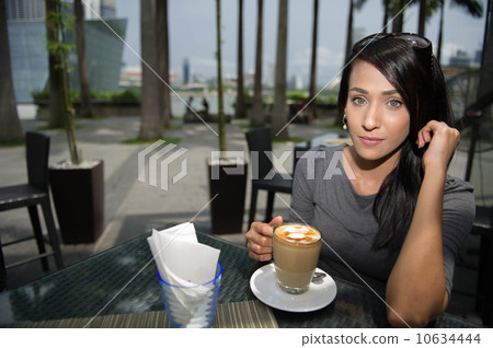Asian Beauty enjoying coffee 10634444