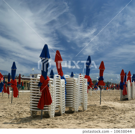 Colorful Parasols on Deauville Beach, Normandy, France 10638044