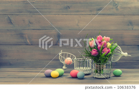 pastel colored tulip flowers and easter eggs 10638376