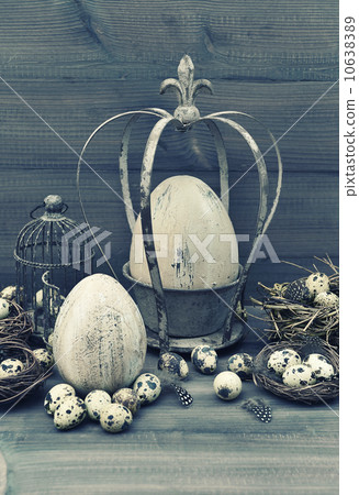 easter decoration with eggs, nest and birdcage easter decoration with eggs, nest and birdcage 10638389