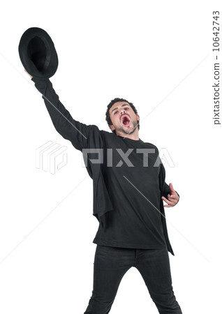 Young man with hat in hand yelling 10642743