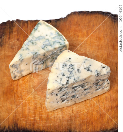 Dorblu cheeses on old wooden board 10644165