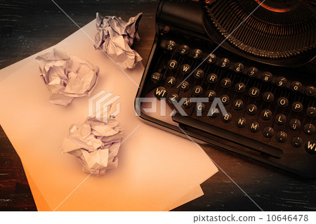 Close-up of an old typewriter with paper 10646478