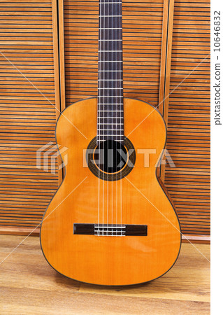 classical acoustic guitar near wall classical acoustic guitar near wall 10646832