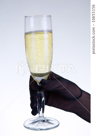 Woman holding champagne glass Woman holding champagne glass 10655156