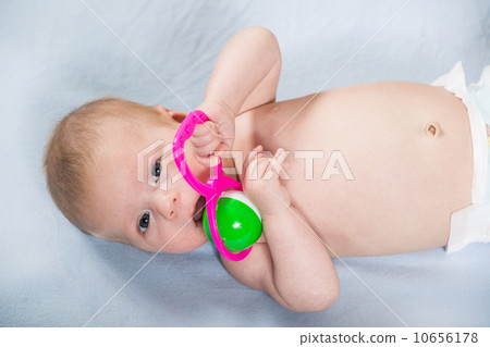 Adorable baby with toy 10656178
